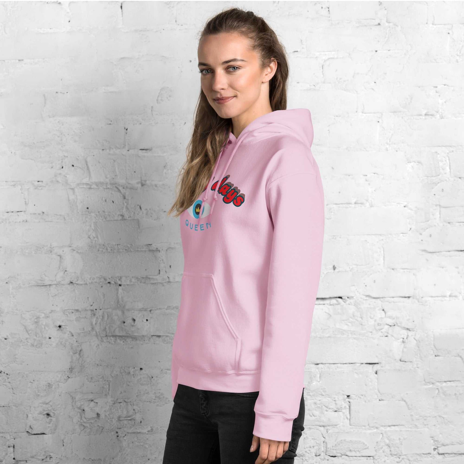 A model wearing The Mykonos Hoodie, showing the relaxed fit, drawstring hood, and the  Crown and "Queen" print on the front center.
