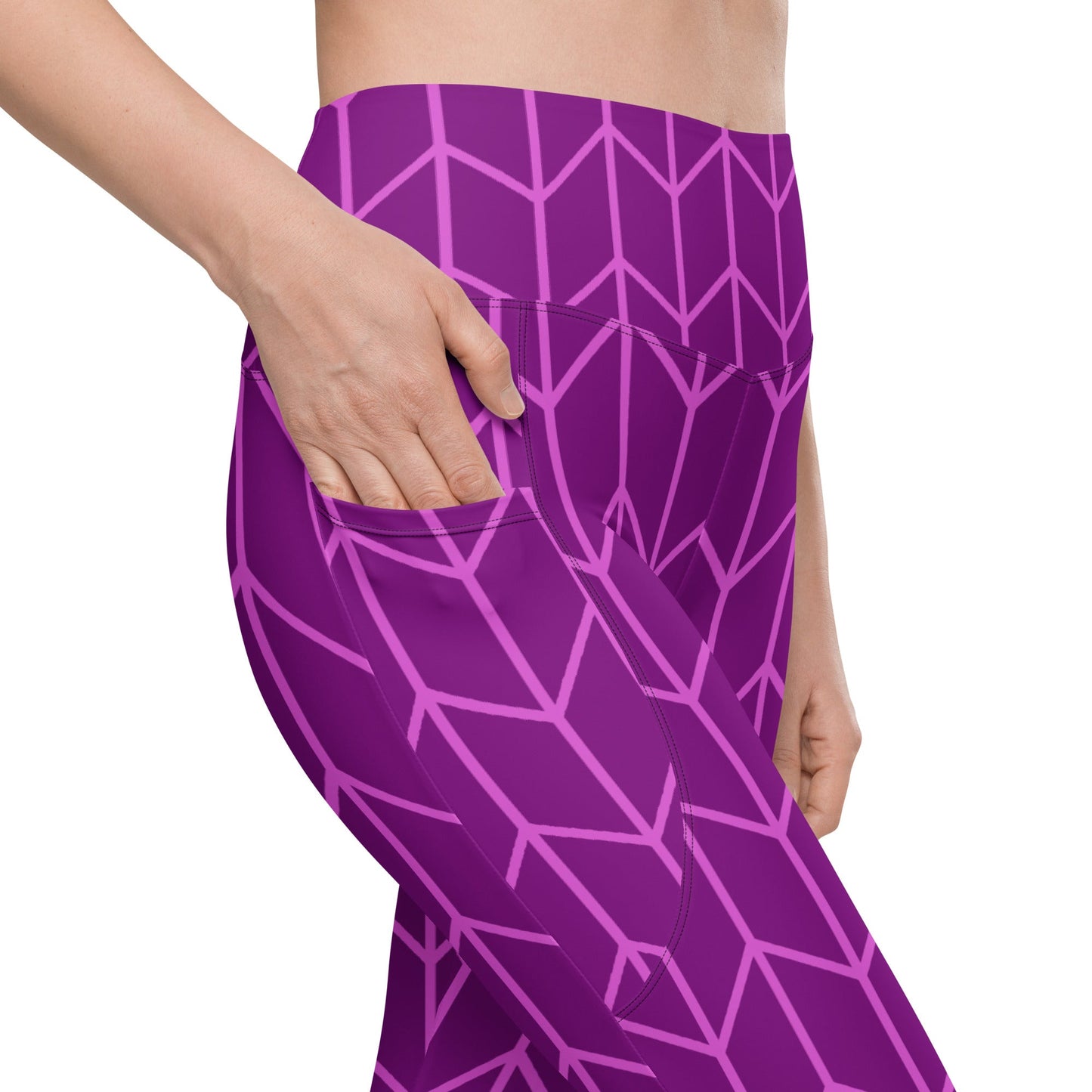 A close-up of The New York Sculpt Leggings, showing the purple and pink Art Deco print and the side pocket.