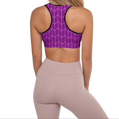 A close-up of The New York Performance Bra, showing the "City Babe" text on the purple Art Deco print.