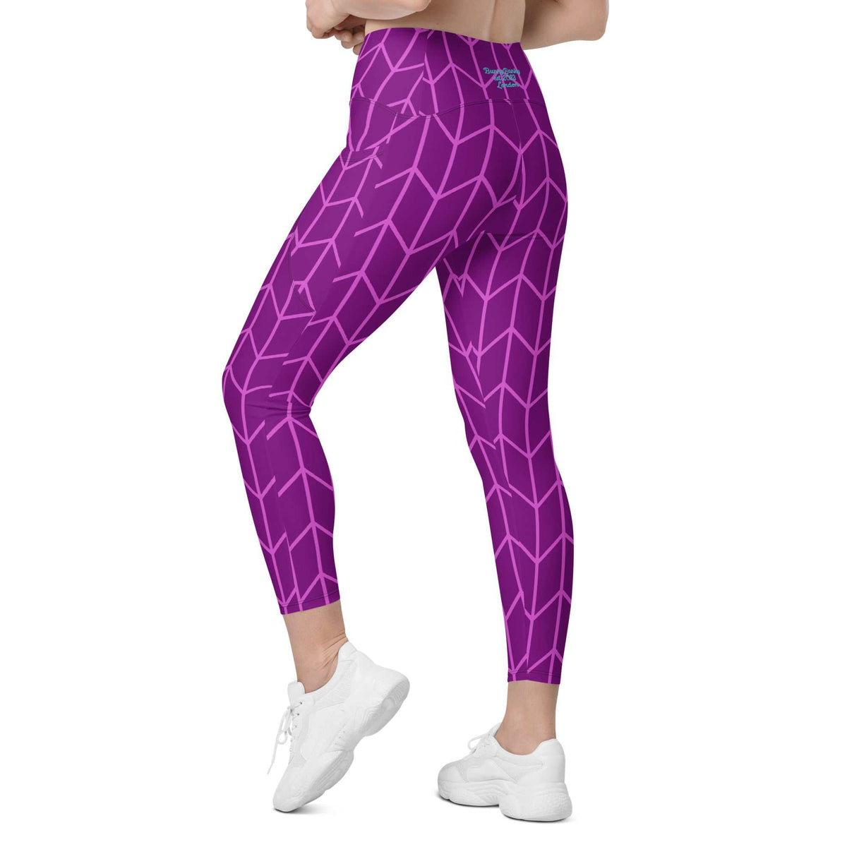 model wearing the New York sculpt leggings featuring a lilac geometric pattern on purple fabric.