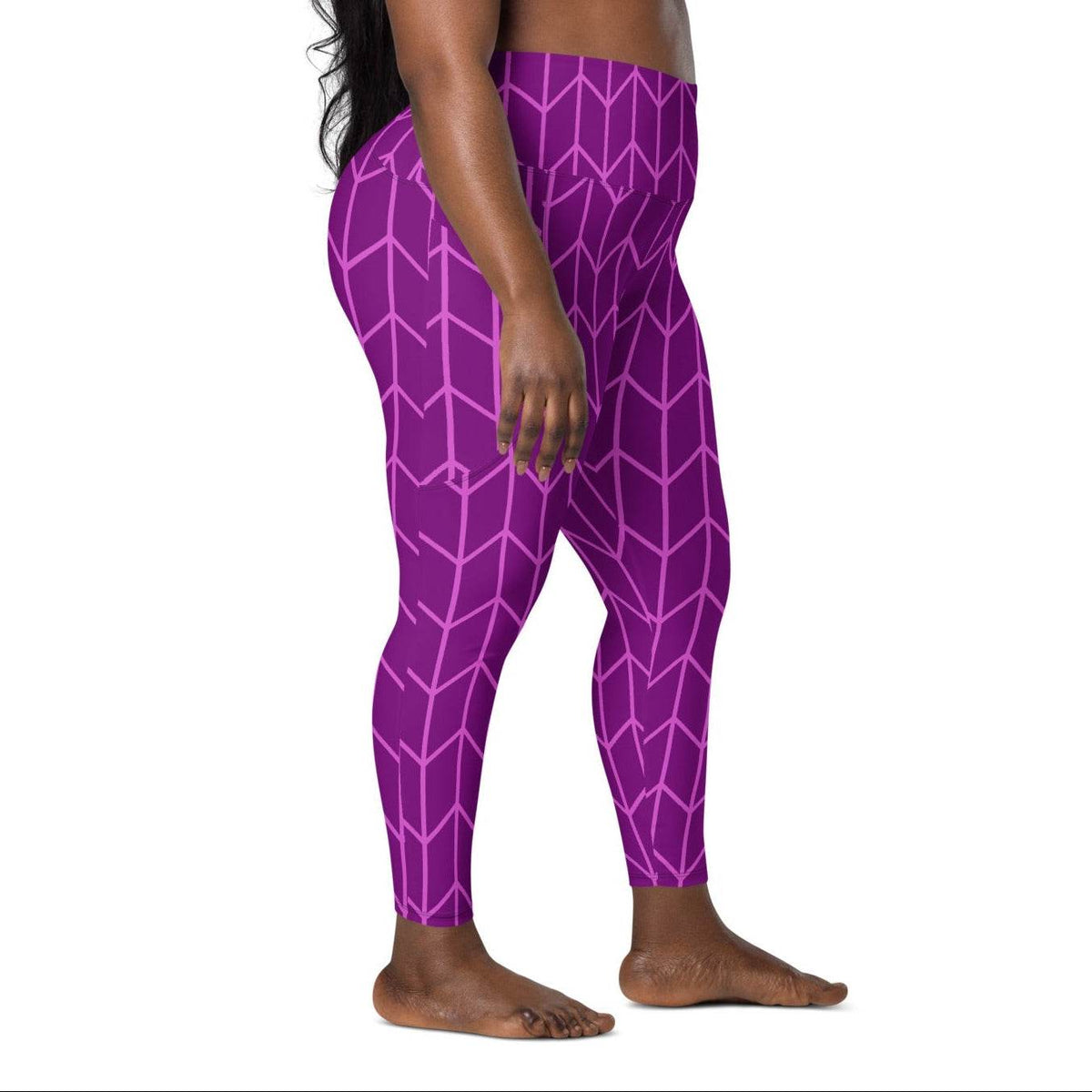model wearing the New York sculpt leggings featuring a lilac geometric pattern on purple fabric.