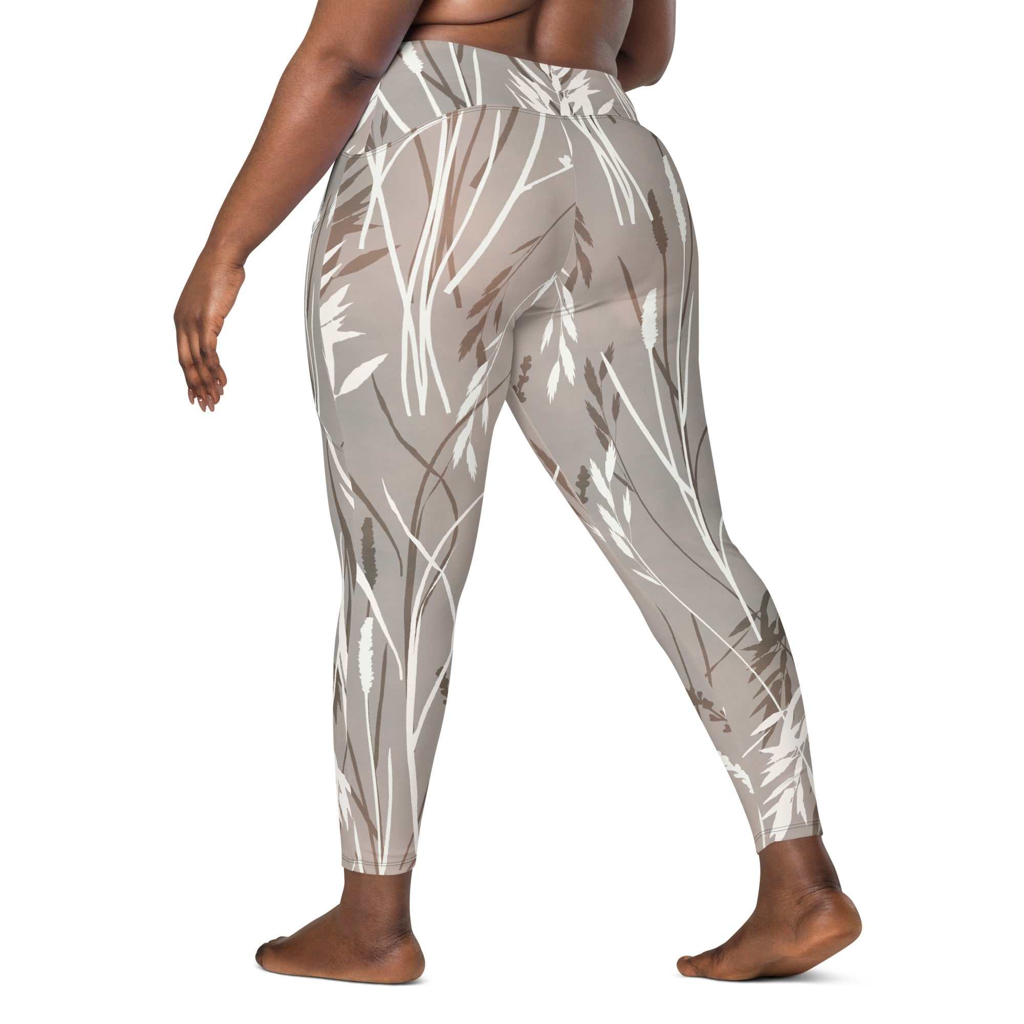 The Osaka Sculpt Leggings in light grey beige with earthy floral brush strokes, high-waisted, soft stretchy fabric, mild compression and dual side pockets.