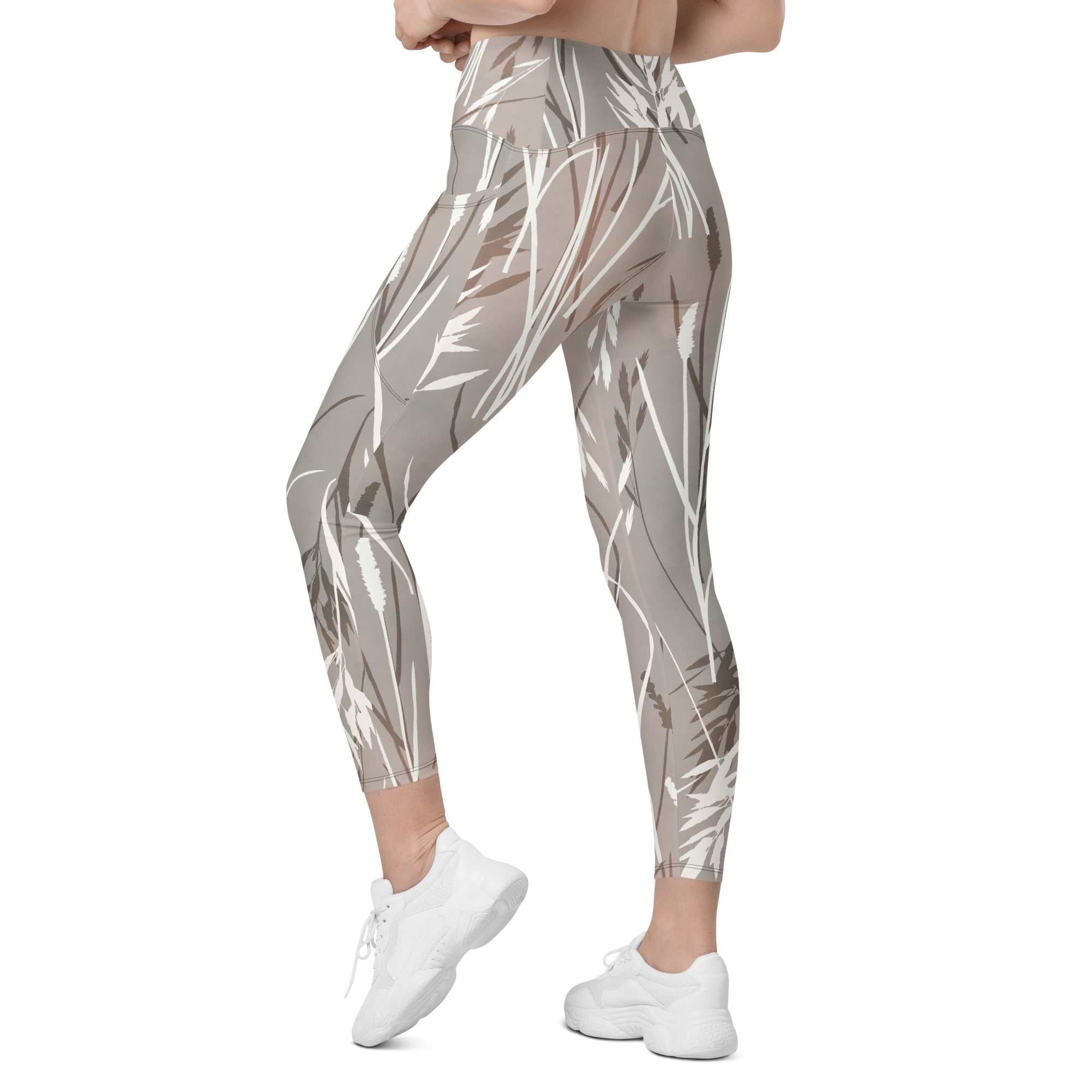 The Osaka Sculpt Leggings in light grey beige with earthy floral brush strokes, high-waisted and mild compression for support.