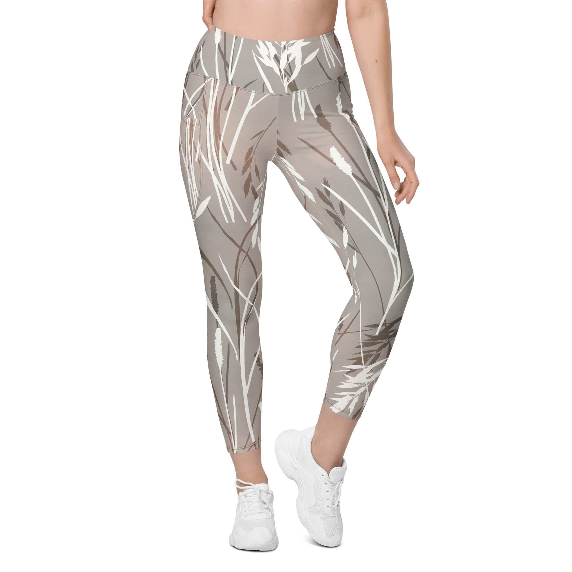The Osaka Sculpt Leggings in light grey beige with earthy floral brush strokes, high-waisted, mild compression, dual side pockets, and UPF 50+ protection.