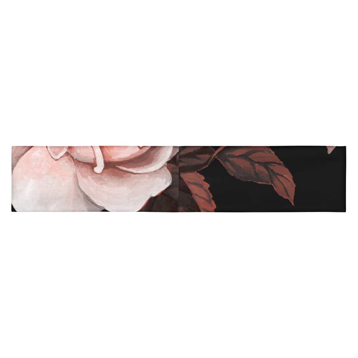 The Paris headband is an elastic featuring a floral print with pale pink and white flowers on a solid black background.
