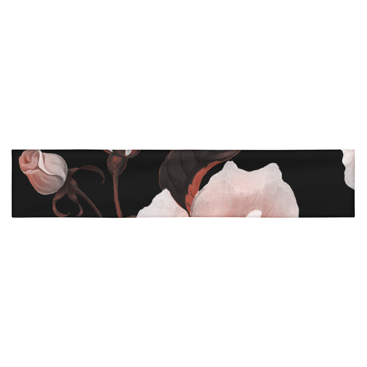 The Paris headband is an elastic featuring a floral print with pale pink and white flowers on a solid black background.
