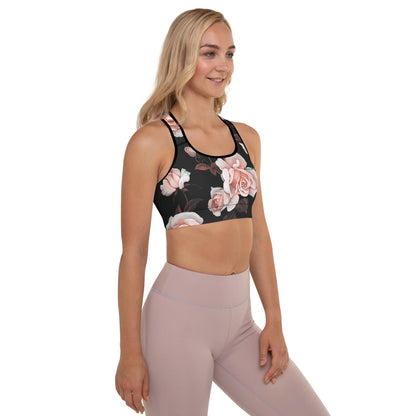 A model wearing The Paris Performance Bra, showing the wide-leg cut and the dramatic XL pale pink rose print.
