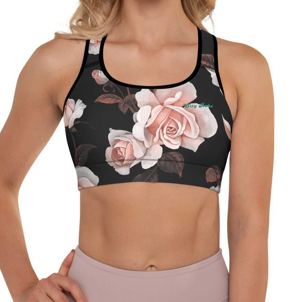A model wearing The Paris Performance Bra, showing the wide-leg cut and the dramatic XL pale pink rose print.