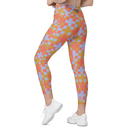 Side view of the Pixel Glam Sculpt Leggings on a model, showcasing the flattering body-contouring effect of the geometric print and the secure, seamless fit of the high waistband.