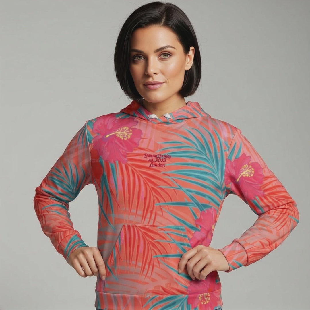 Video of the BunnyBanky AI Model wearing the BunnyBankY District hoodie highlighting the vibrant pink , orange, and blue colours in a tropical floral print
