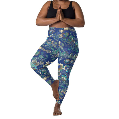 A model wearing the Rio Sculpt Leggings in the bright blue floral print, showing the flattering high-waisted fit and side pocket detail.