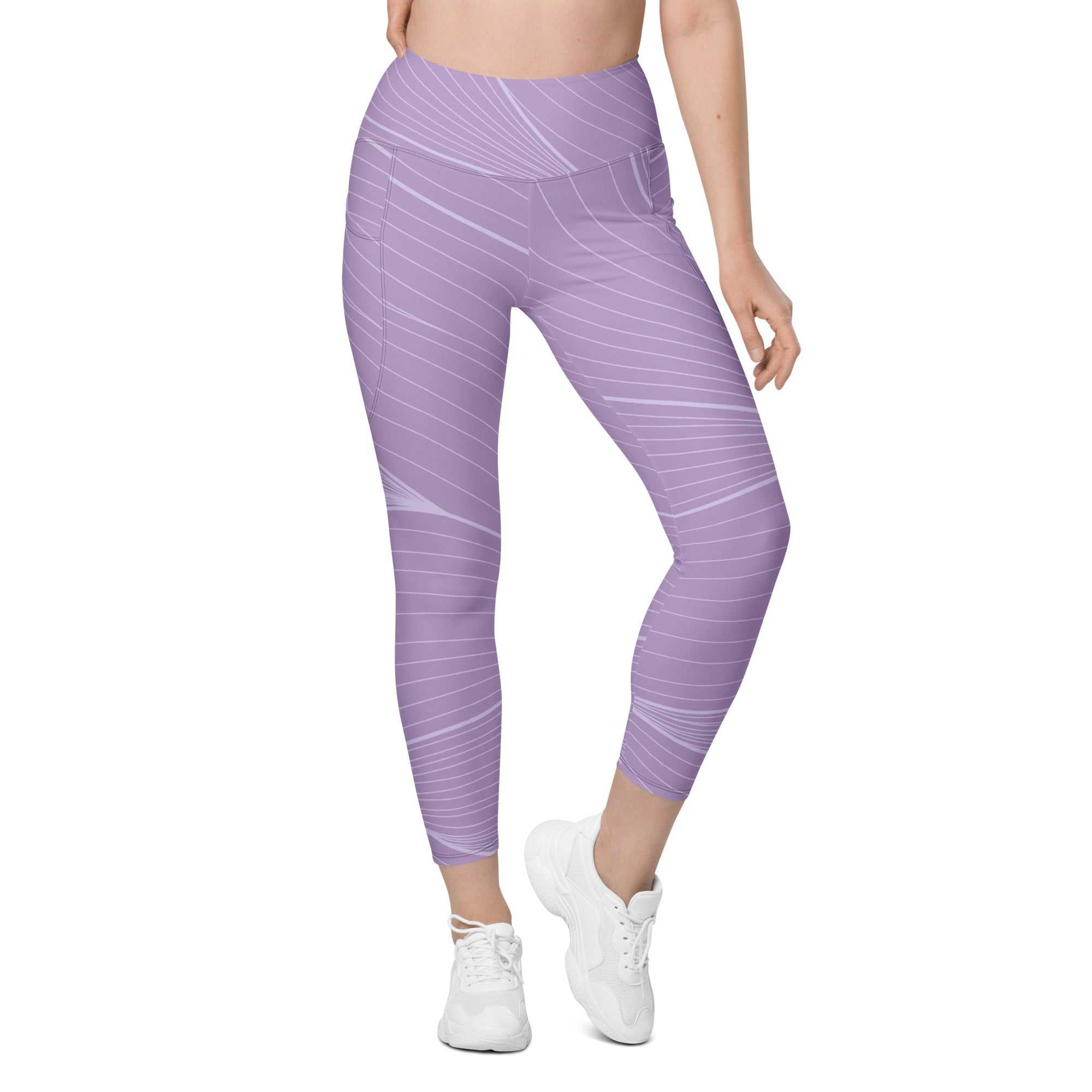 The Roma Sculpt Leggings in light lilac with graphic spiral print, high-waisted, soft stretch fabric, mild compression, and deep side pockets for activewear.