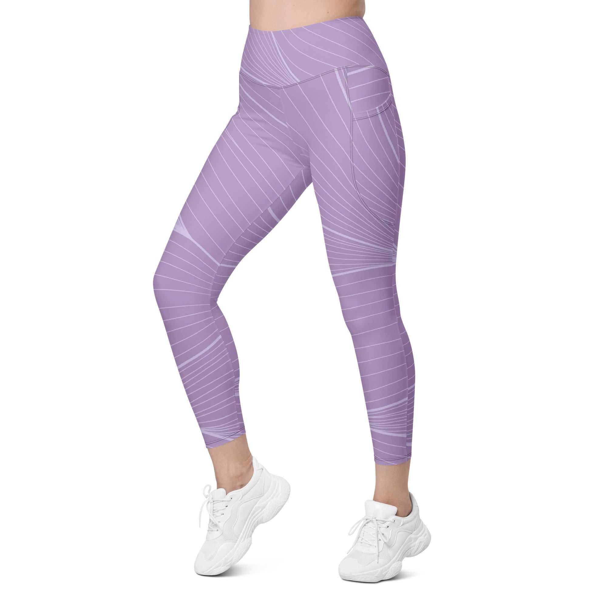 The Roma Sculpt Leggings in light lilac with graphic spiral print, high-waisted fit, dual side pockets, and mild compression fabric for activewear.