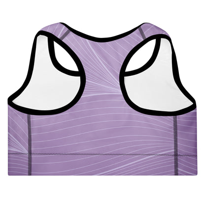 Close-up of the front of the Roma Performance Bra, highlighting the bold "City Babe" text printed on the top left and the dynamic graphic spiral print details.