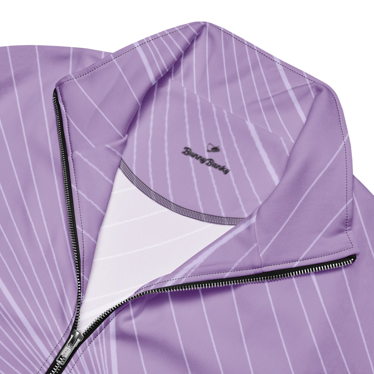 The Roma Track Jacket, showing the lightweight fit and the vibrant lilac graphic print 