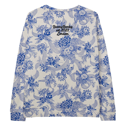 The Saint Germain Sweatshirt, highlighting the "Goal Digger" embroidery on blue floral pattern on cream fabric and the iconic signature logo at the back.