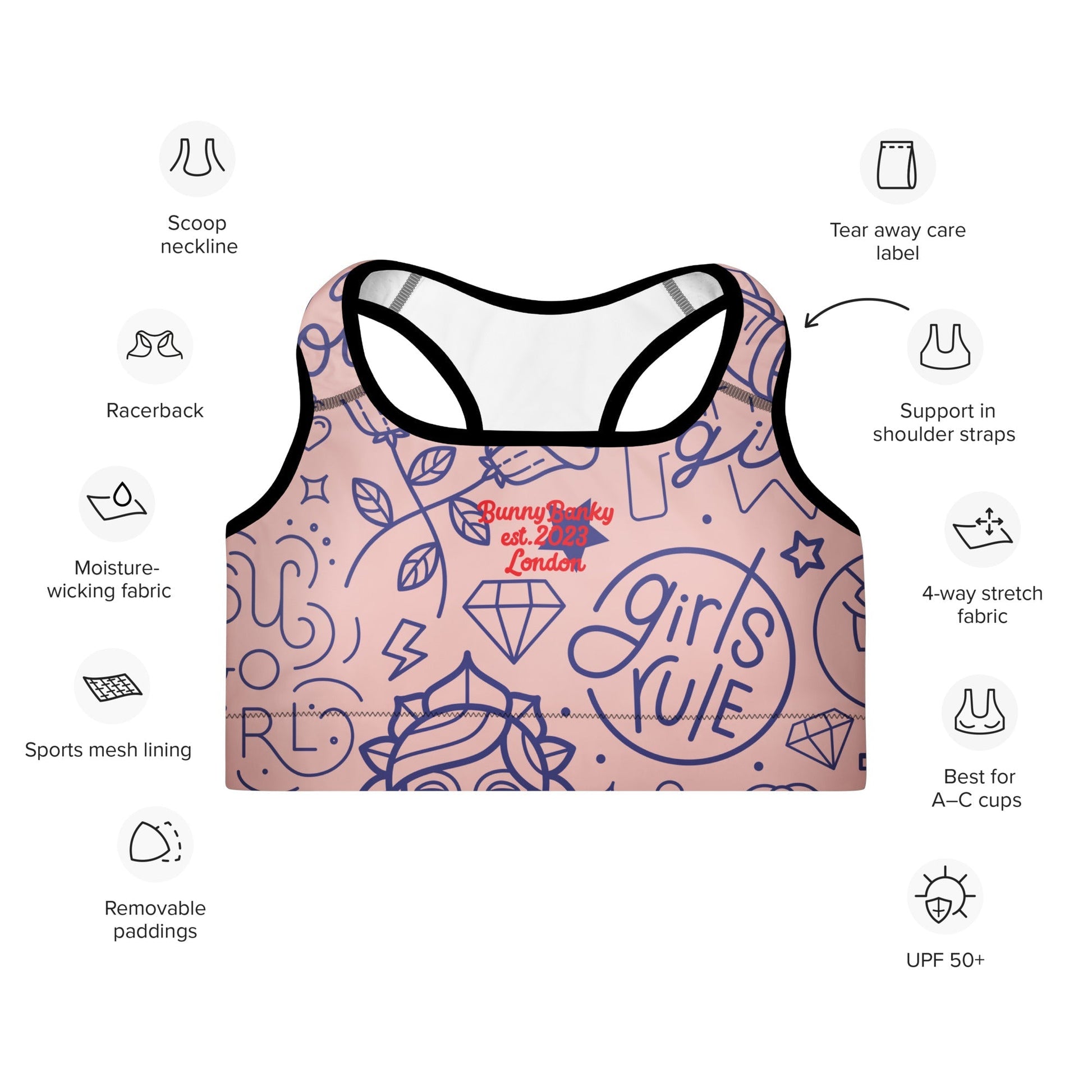 A close up of The Sisterhood Performance Bra, showing the supportive fit and the high-impact "Girl Power" collage print.