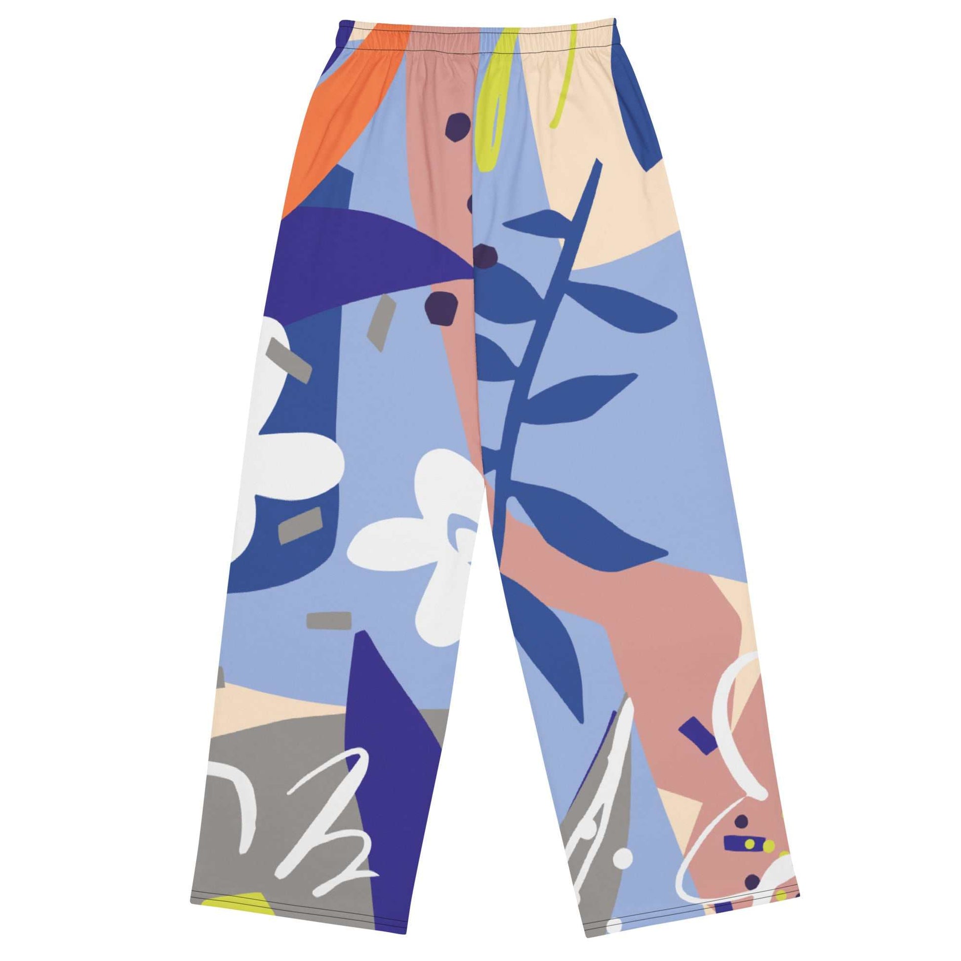The Surrey Flow Joggers featuring a vibrant floral print and lilac and blue hues highlighting the wide leg cut and relaxed fit with side pockets and adjustable waist.