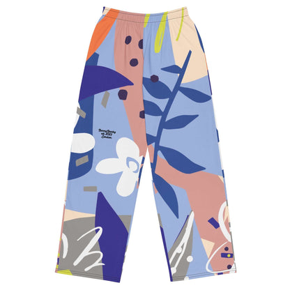 The Surrey Flow Joggers featuring a vibrant floral print and lilac and blue hues highlighting the wide leg cut and relaxed fit with side pockets and adjustable waist.