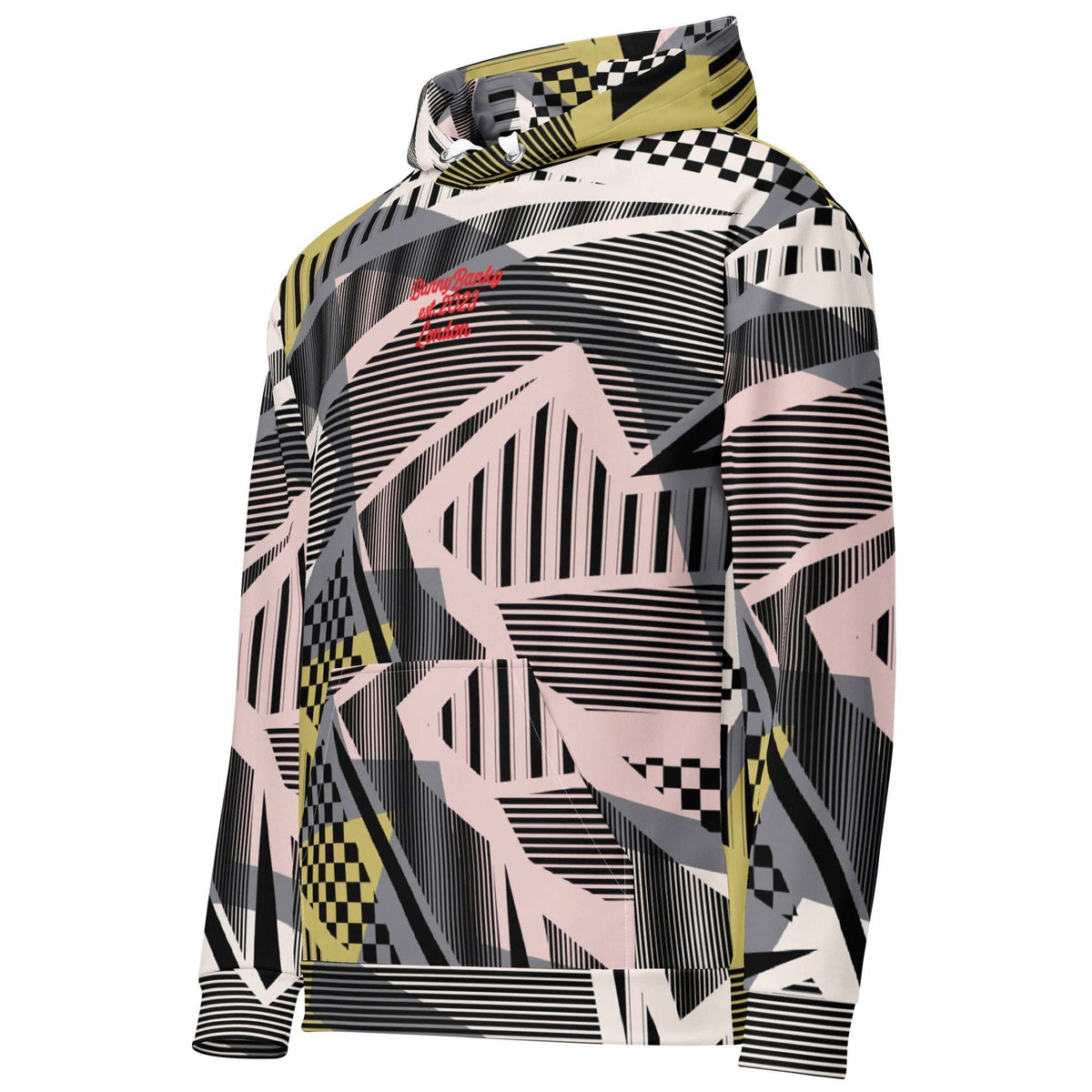 A close up of the Sydney Hoodie. The image highlights the Art Deco-inspired pattern of checkers and pinstripes in soft pink, sand, and olive tones, featuring red London branding.