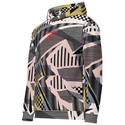 A close up of the Sydney Hoodie. The image highlights the Art Deco-inspired pattern of checkers and pinstripes in soft pink, sand, and olive tones, featuring red London branding.