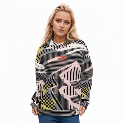 A BunnyBankY AI proprietary model wearing the Sydney Hoodie. The image highlights the Art Deco-inspired pattern of checkers and pinstripes in soft pink, sand, and olive tones, featuring red London branding.