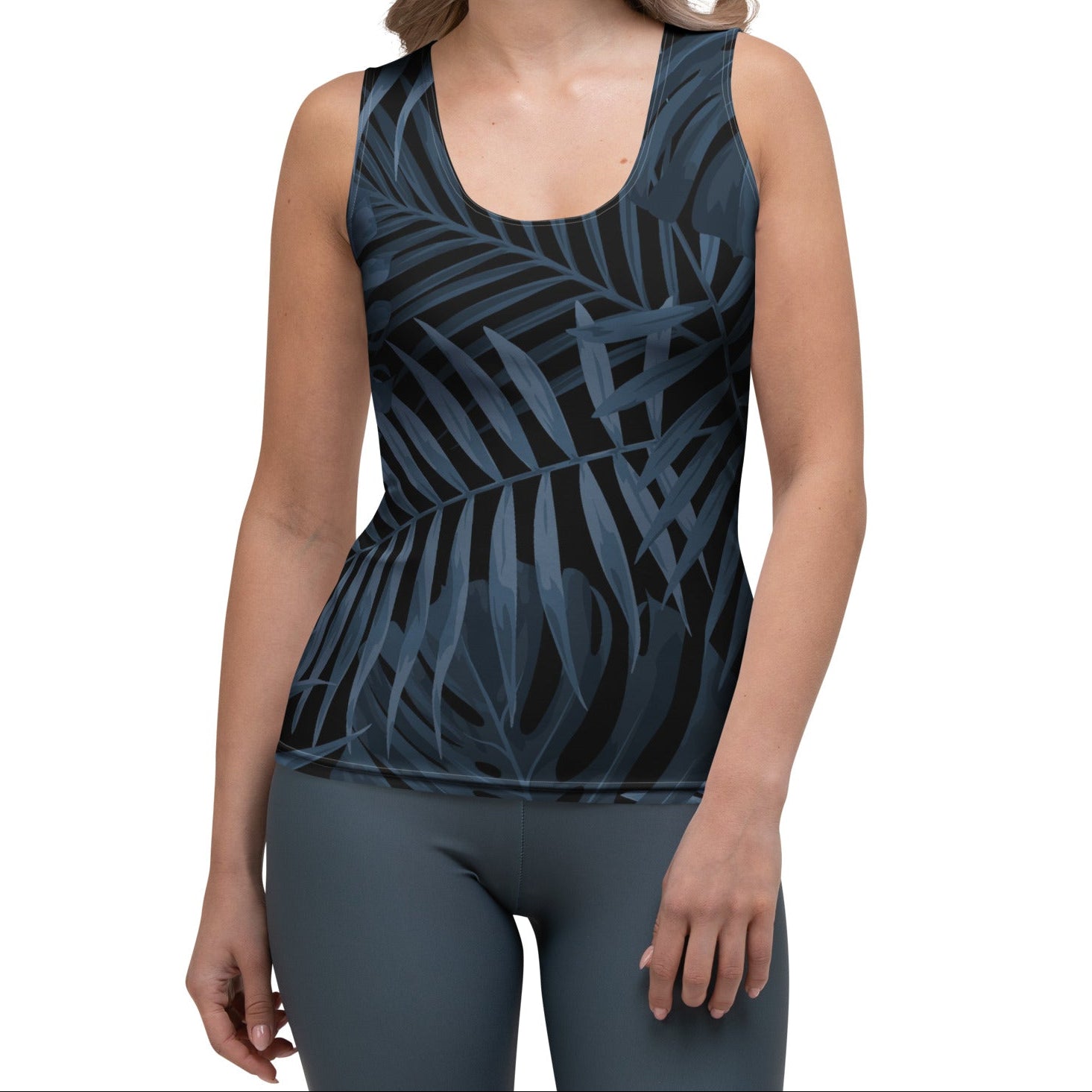 The Toulouse Performance Tank. A sleeveless racerback tank top featuring a dark navy blue and black tropical palm leaf pattern, displayed on a clean white background.