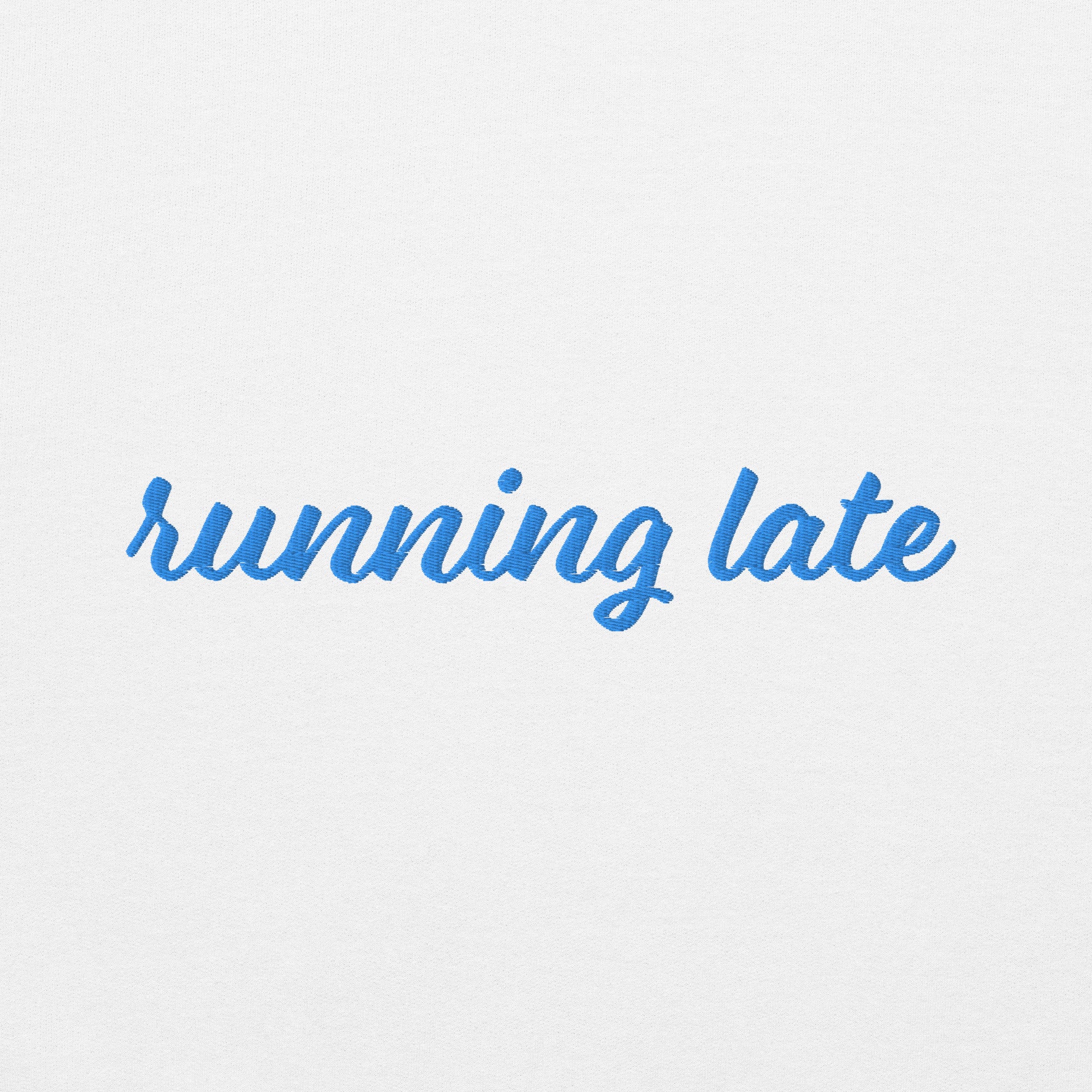 A close-up of The Running Late Sweatshirt, highlighting the 