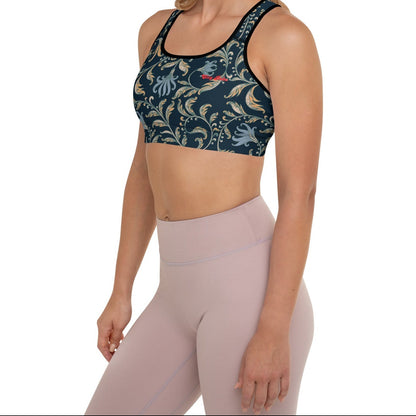 Model wearing the Venice Performance Bra featuring a parsley and floral pattern in dark blue with beige and light blue details, and the text City Babe at the top left.