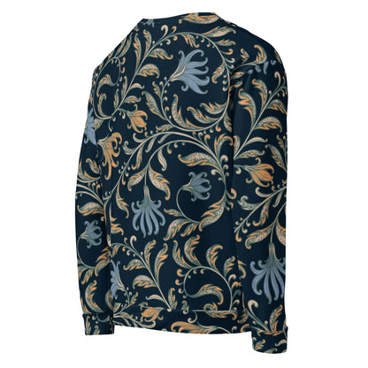 A model wearing the Venice sweatshirt with a dark navy blue background and an intricate botanical pattern in gold, beige, and light blue. The joggers feature a small red logo on the left hip.