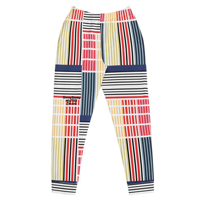 A close-up of The Vienna Slim Joggers' Art Nouveau inspired print, showing the grid of black lines and colorful geometric rectangles on the recycled polyester fabric.